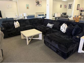 Sectional in black corduroy