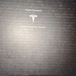 Brand new Tesla Mobile connector