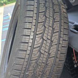 1 Used Tire with good threads. 