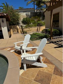 2 White Outdoor Adirondack Chairs