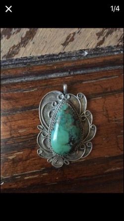 Sterling silver and turquoise pendent signed J.M.