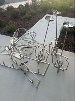Five Chrome Chandeliers (three smaller individual, one long for a big room, one circular)