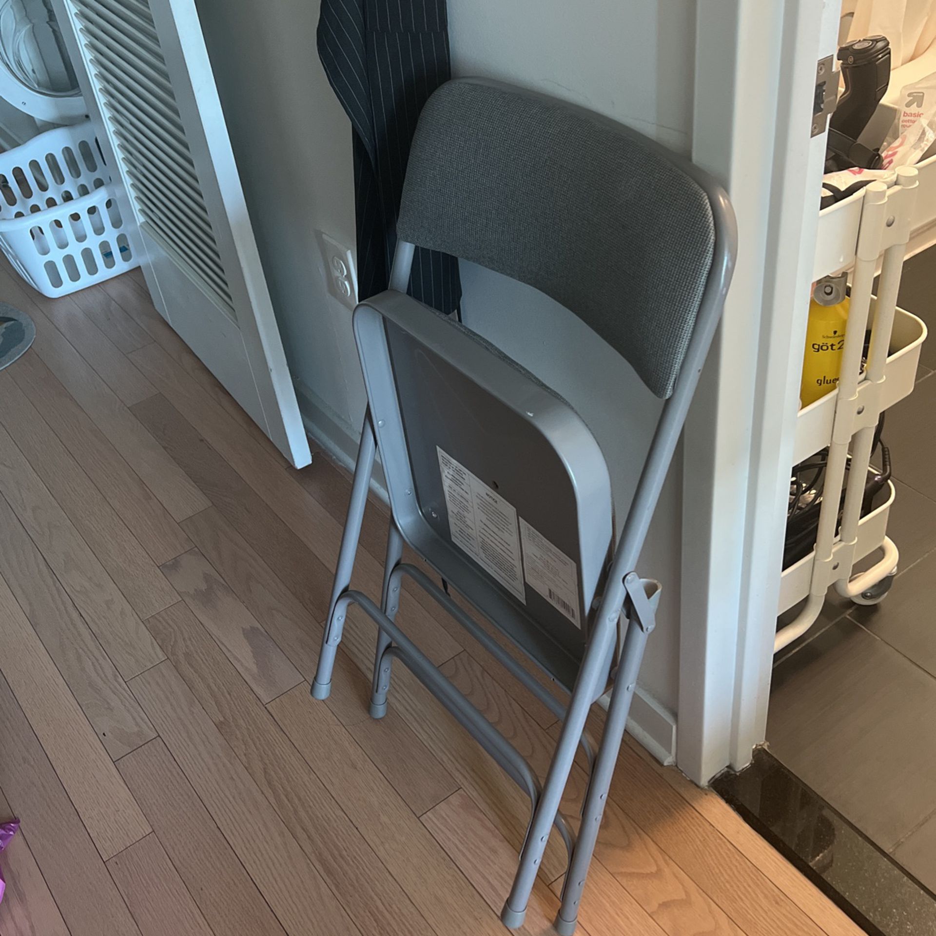 grey padded metal foldable Chair