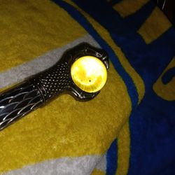 Walking Staff Unlocks To Two Katana Blades