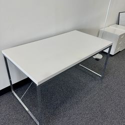 White desk with chrome legs