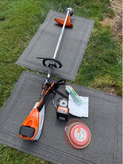 Stihl Commercial Battery powered Weed Wacker/ Trimmer with accessories 550.00