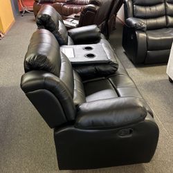 New black reclining, two-piece sofa and loveseat, including free delivery