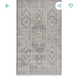 R65#22 $75 nuLOOM Amanda Grey 5 ft.
x 8 ft. Tribal Panels Fringe Indoor/Outdoor
Area Rug