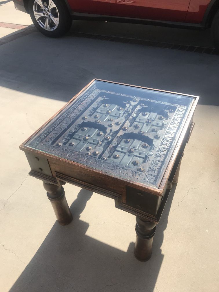 Upscale House Furniture - Antique Style Reclaimed Wood Indian Chai Side/End Table with Glass Top And Brass Medalions