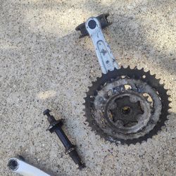 Two  multiple speed bicycle cranksets w bottom brackets