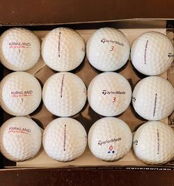 6 TaylorMade Tour Response & 6 Kirkland Premium Plus & Ball