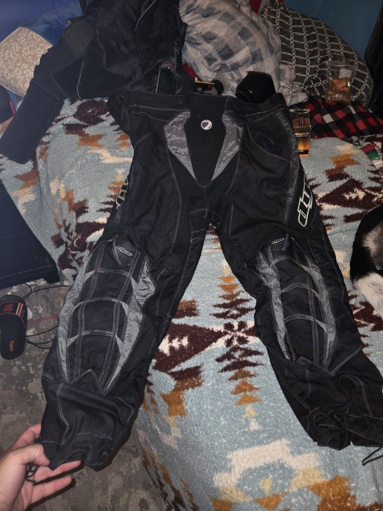 Dye black and gray paintball pants.