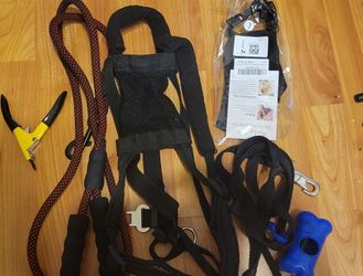2 leashes, a harness, nail clippers and brand new muzzle