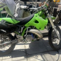 97 Kawasaki Two-Stroke Title In Hand