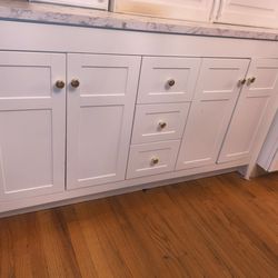 2 white fairly never used just stayed for property Bathroom Vanity's