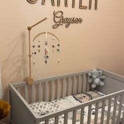 Ikea Crib and Changing table with two ample draws under