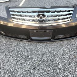 2006-2008 Infiniti M35/45 Front Bumper With Grill And Emblem And Fog Lights With Accessories OEM.