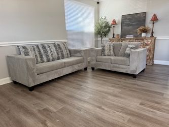 Gray sofa and loveseat set