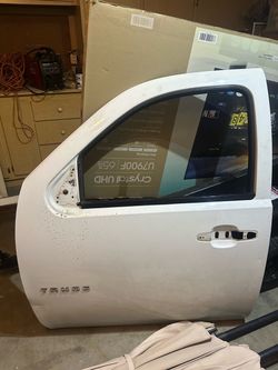 Chevy Tahoe suburban drivers door