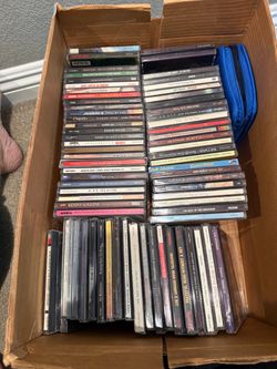 Various CDs with brand new CD player
