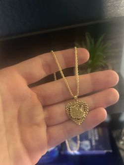 10k gold rope chain and pendant
