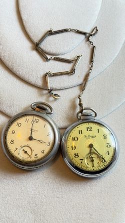 Two vintage pocket watches, one is with a silver chain