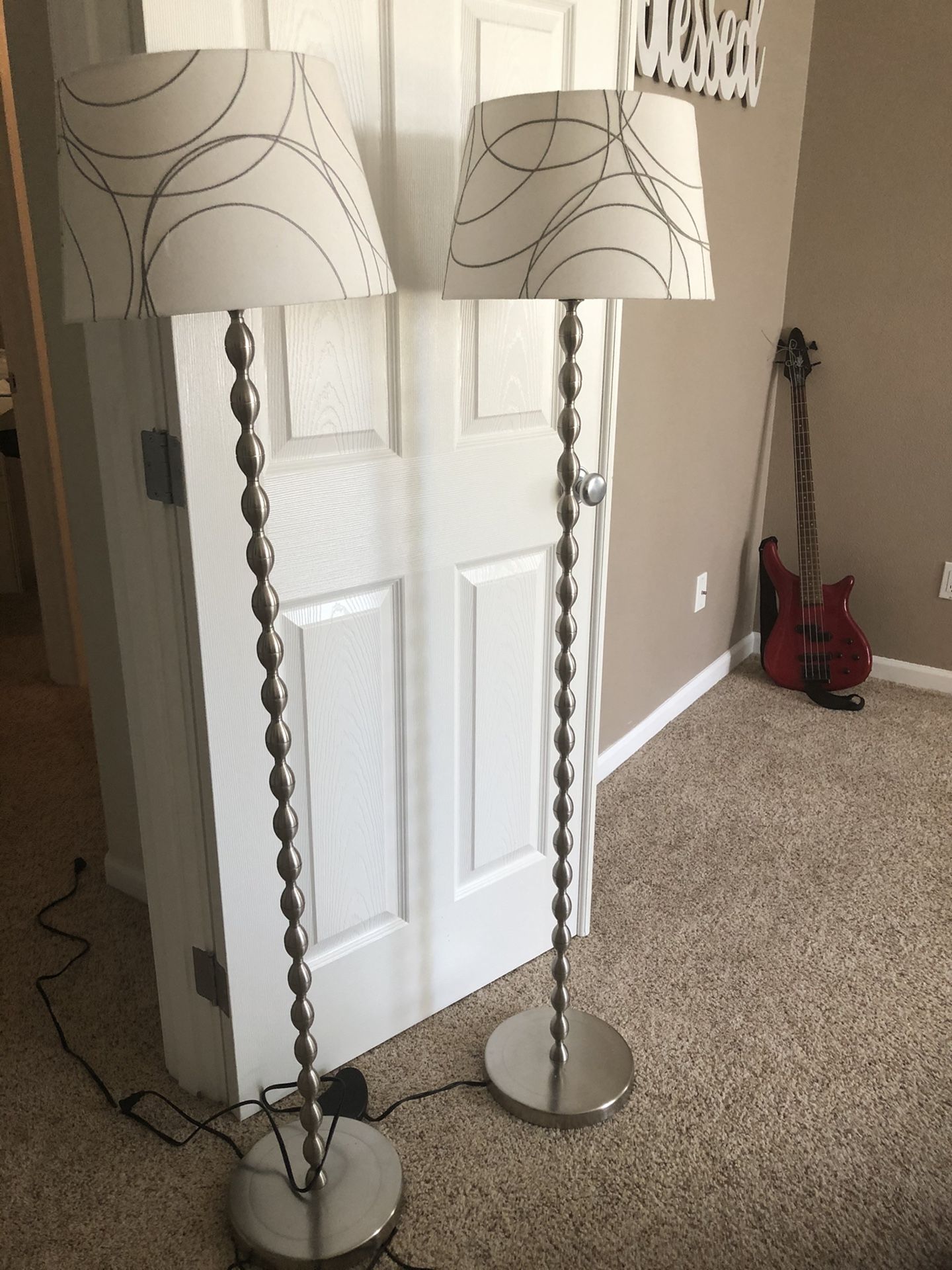 Two floor Lamps for sale.