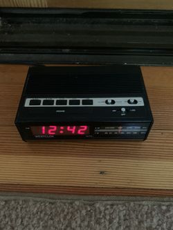 Vintage alarm clock with radio