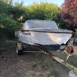 Old Boat w/trailer  100.00 OBO. 