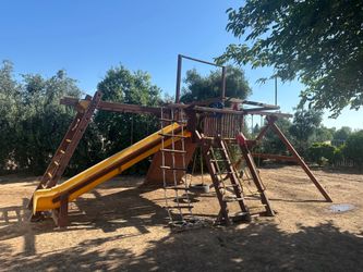 Rainbow Super Castle Wood Swing Set Play System