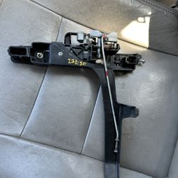 Used passenger side interior door handle bracket for a Ford Fusion (2006–2012).