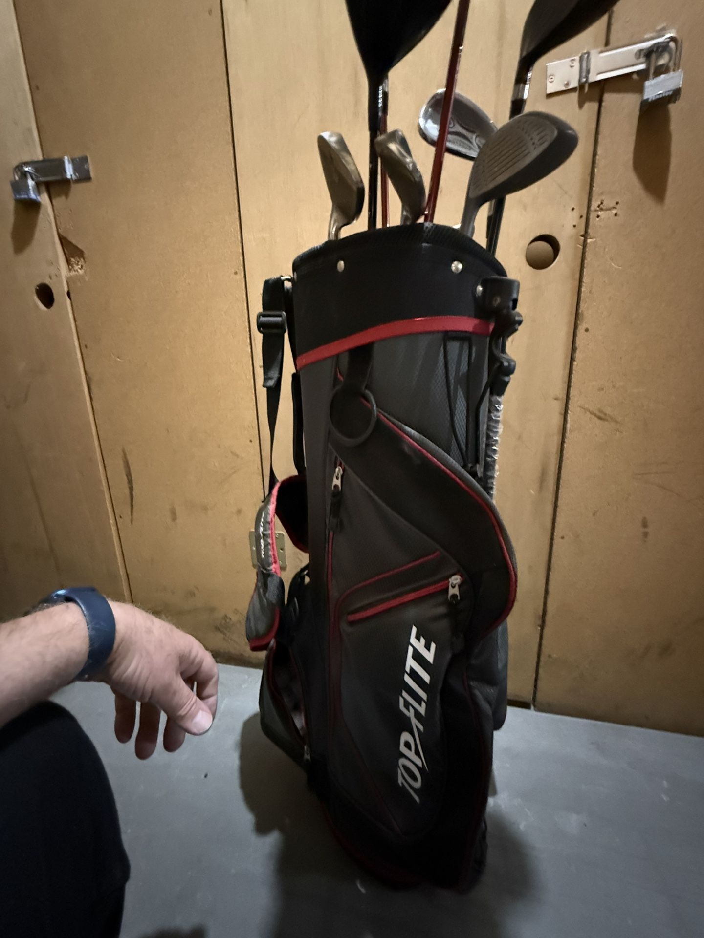 Golf Clubs And Carrier