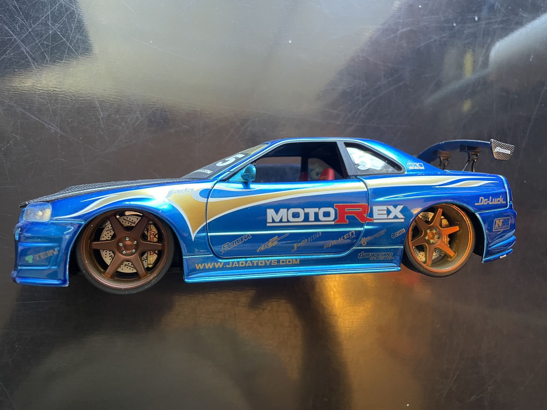 Jada Diecast Import Racer Nissan Skyline GTR R34 Blue Falken Motorex 1:24 Model Rare In Mint Condition