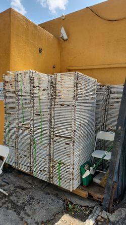 Used white folding chairs s,a,l,e