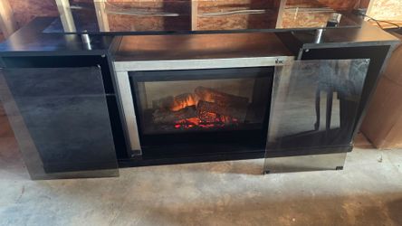 Entertainment center with fireplace