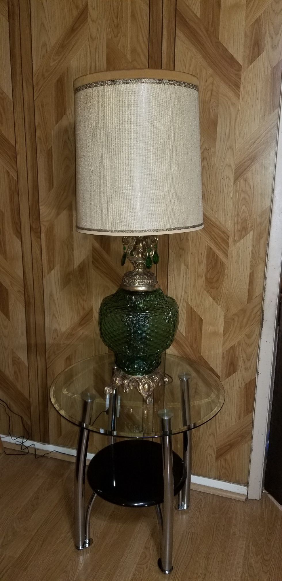 Antique green glass lamp.
