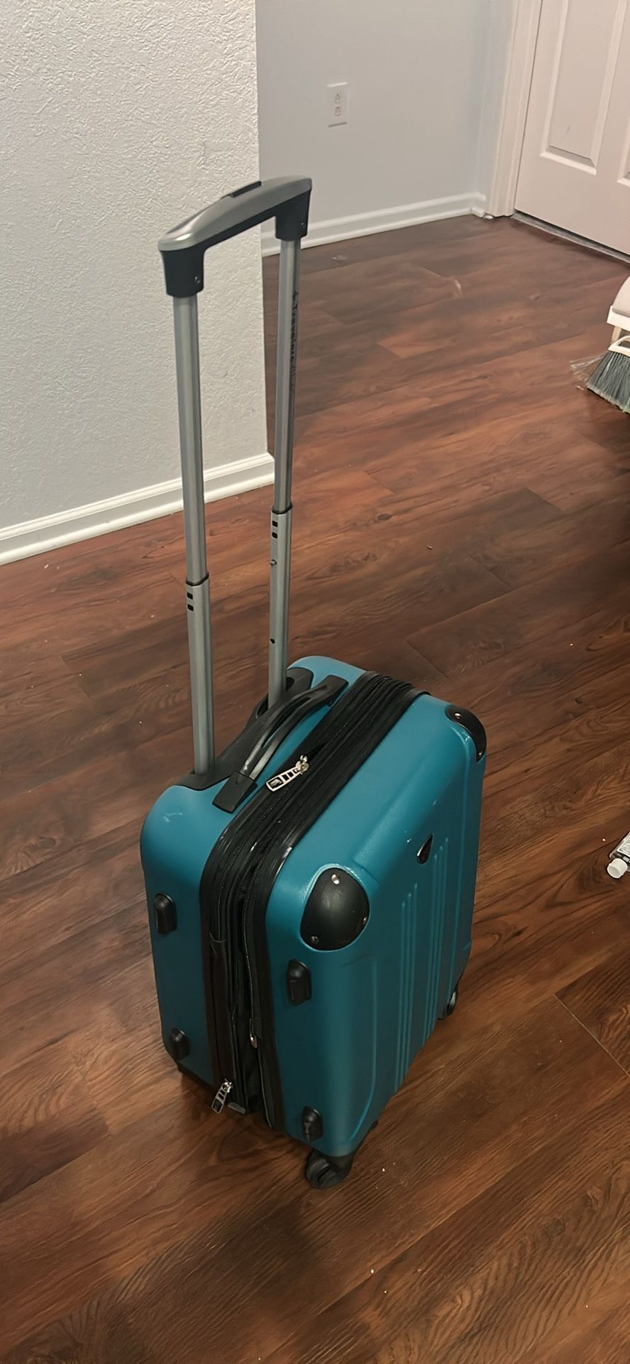 Blue Hard shell Wheeled Suit Case