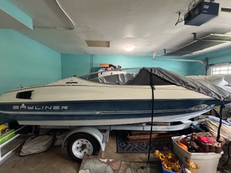 boat for sale with trailer and a lot of extra stuff for summer fun