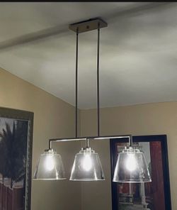 Dining room light - Allen & Roth three light chandelier brush nickel with clear glass shade.