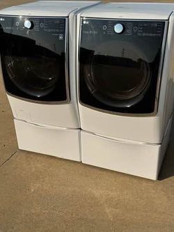 Great  front load lg washer and front load lg dryer high efficiency with pedestals  in excellent working condition condition no problems at all with w