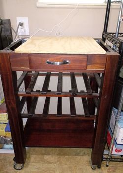 Solid wood wine cart. Needs a top.