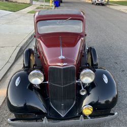 1933 pontiac 3 window sport coupe. Twin side mounts, rumble seat. Straight 8. 8 volt. New original style coil. Mohair interior