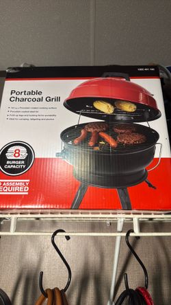 Portable charcoal grill