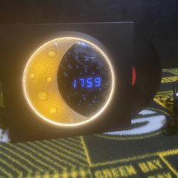 Rounded X09 Portable Moon Clock Bluetooth Speaker.