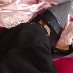 Bag Of Womens Clothes And Pair Of Shoes 