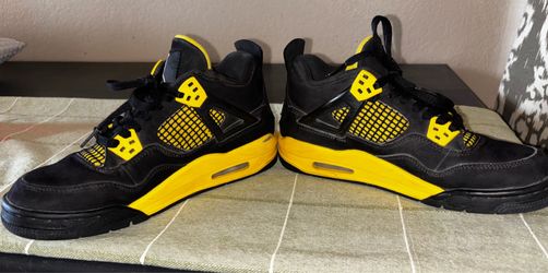 Youth- Air Jordan 4 Retro “Thunder” sneakers