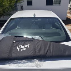 Gibson Soft Guitar And Guitar Strap.  New. 