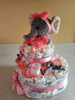 Adorable Dark peach,Gray &White Baby Elephant Diaper Cake size 1 Pampers brand diapers.