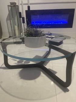 Cb2 Coffee Table Heavy Glass And Black Legs