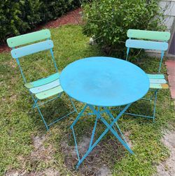 French bistro-style folding metal patio set